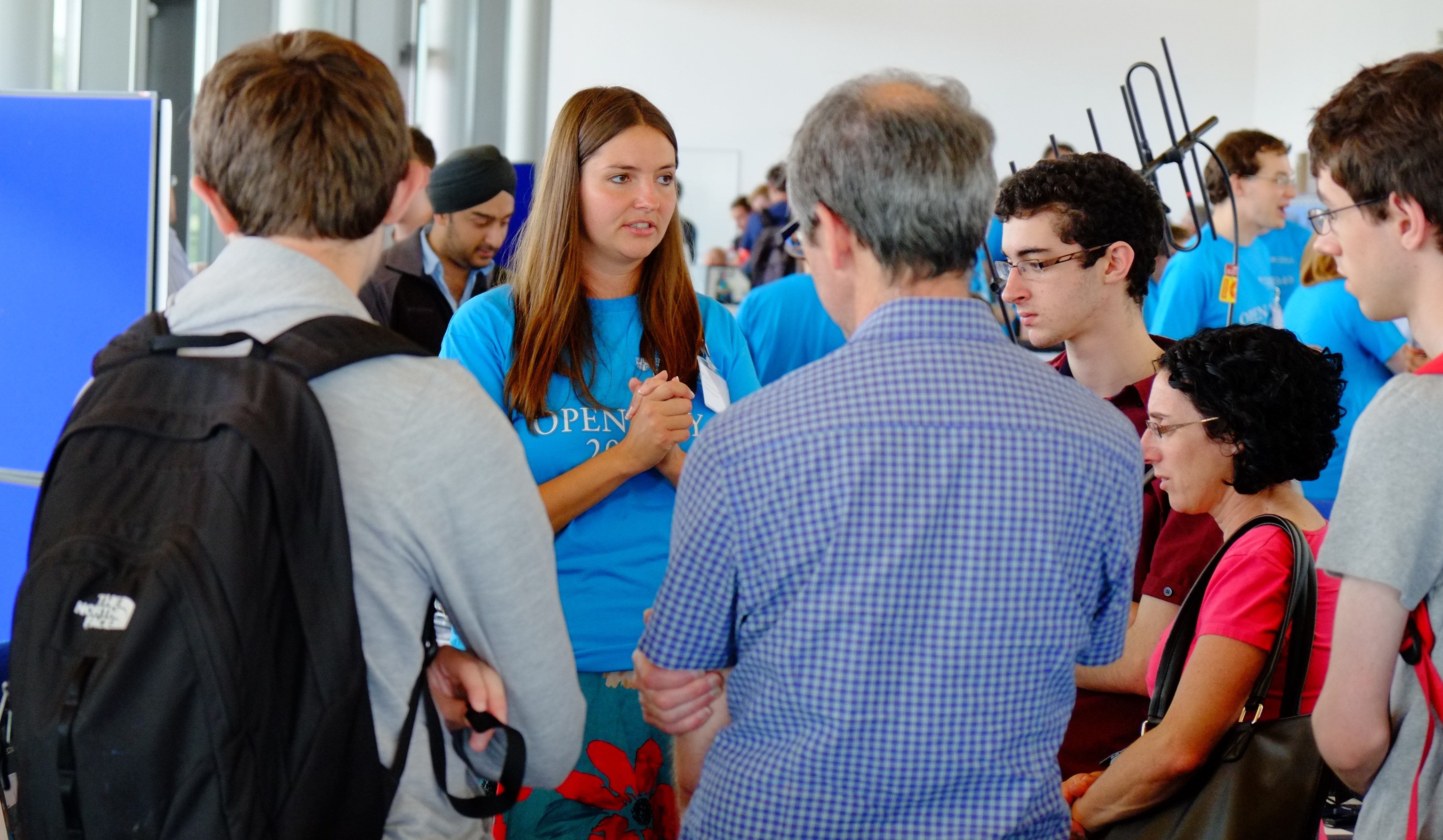 Cambassadors assisting at a University Open Day, talking to prospective students and their families