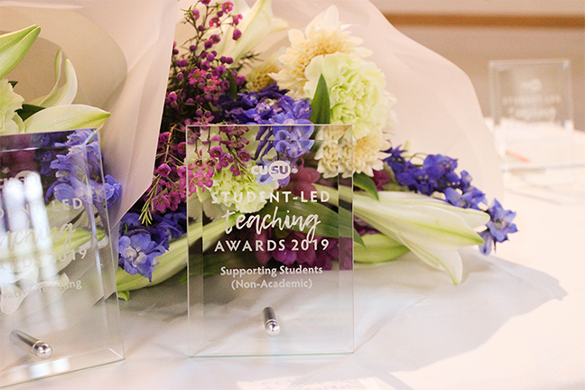 A trophy and bouquet presented at the Student-Led Teaching Awards 2019