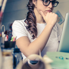 woman working at computer in studio