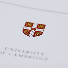 University shield on the front cover of a publication
