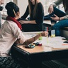 Photo of students working on a project together