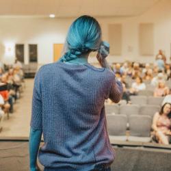 Lecturer preparing to each looking out on the audience