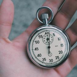 Stopwatch cradled in a hand