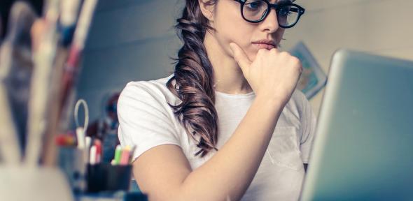 woman working at computer in studio