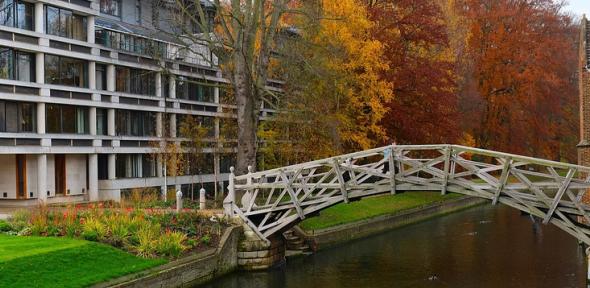 The Mathematical Bridge of Queens College spanning the river in autumn