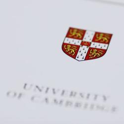 University shield on the front cover of a publication
