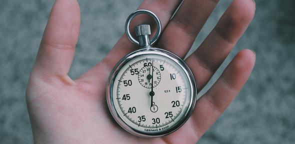 Stopwatch cradled in a hand